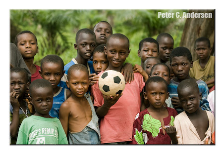 Young footballers wait to take the field in Makeni.
